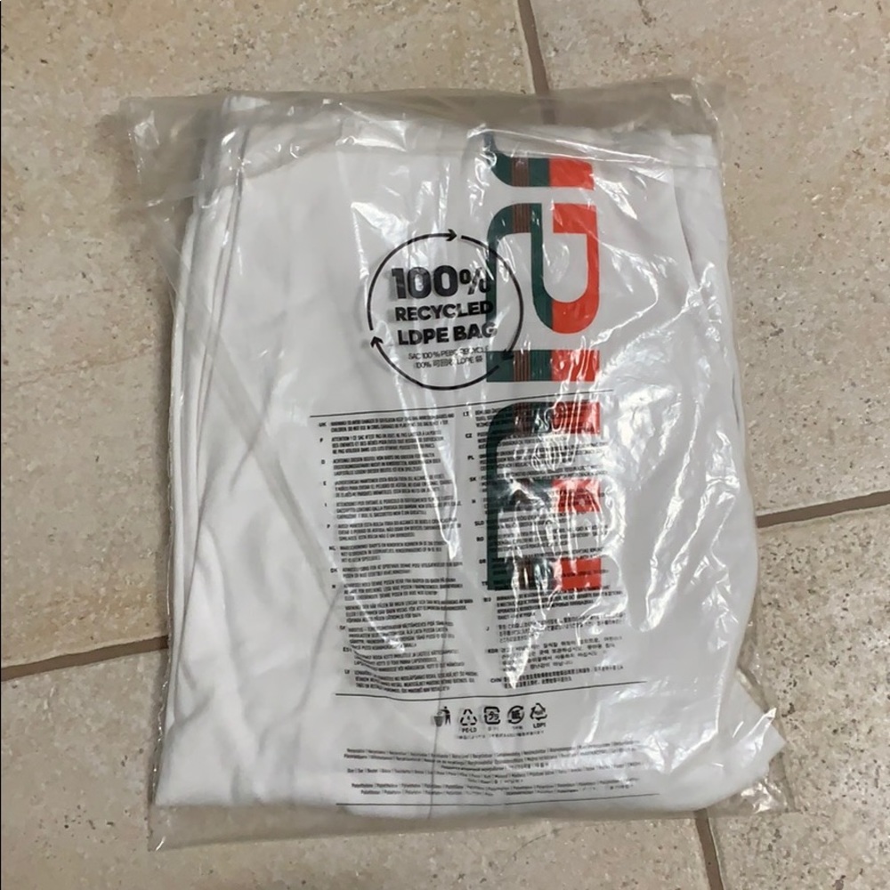 White men’s adidas warm up pants